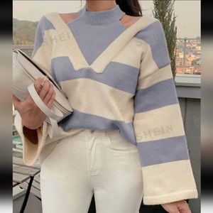NWT DAZY striped bell sleeve sweater with high-neck design, size large.